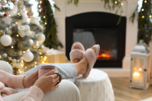 Relaxing with feet up with Christmas decorations in the background